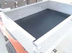 Picture of Diamond plate black rubber cargo box mat