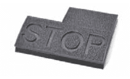 Picture of Brake pedal pad with "STOP" carved into thick solid rubber